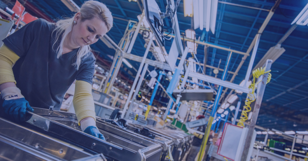 Woman working in a factory assembly line