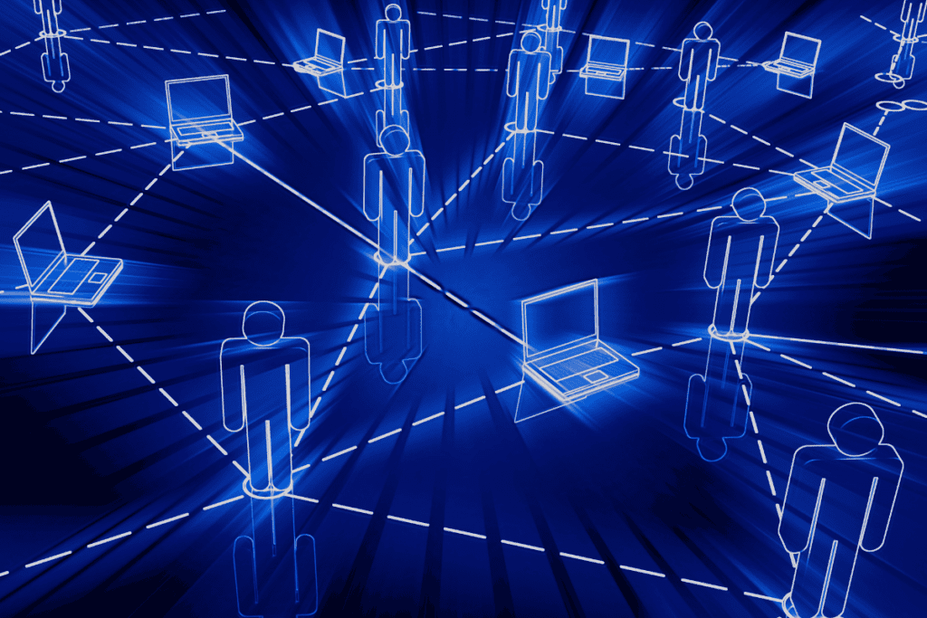 visual representation of edge computing that shows humans with connected lines to IoT devices